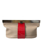 Zweifarbige Clutch aus exotischem Leder