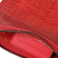 Pochette esotica in pelle di alligatore rosso