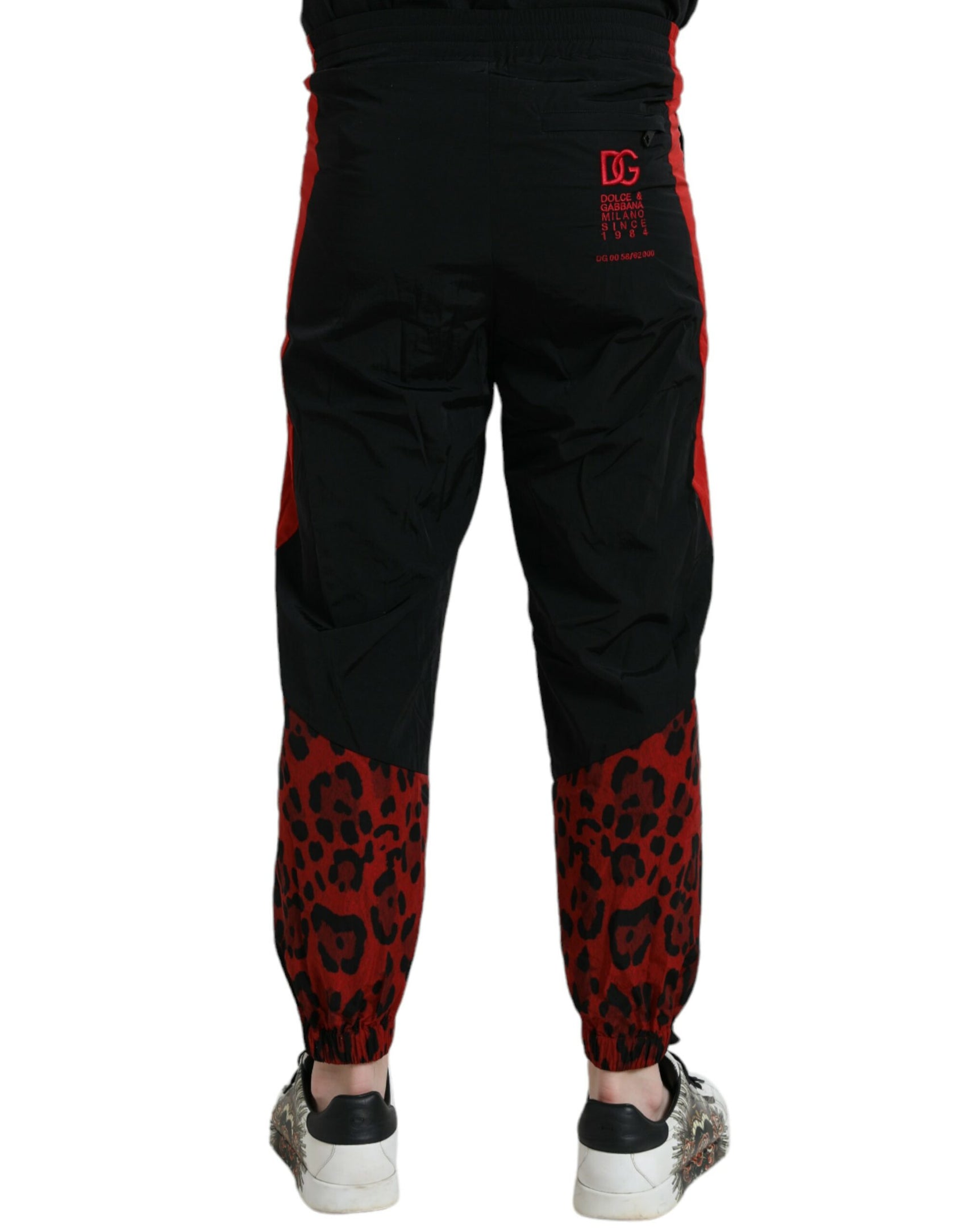 Schwarz-rote Jogginghose aus Nylon mit Leopardenmuster
