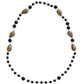 Collana lunga con perline stampate nere in ottone color oro