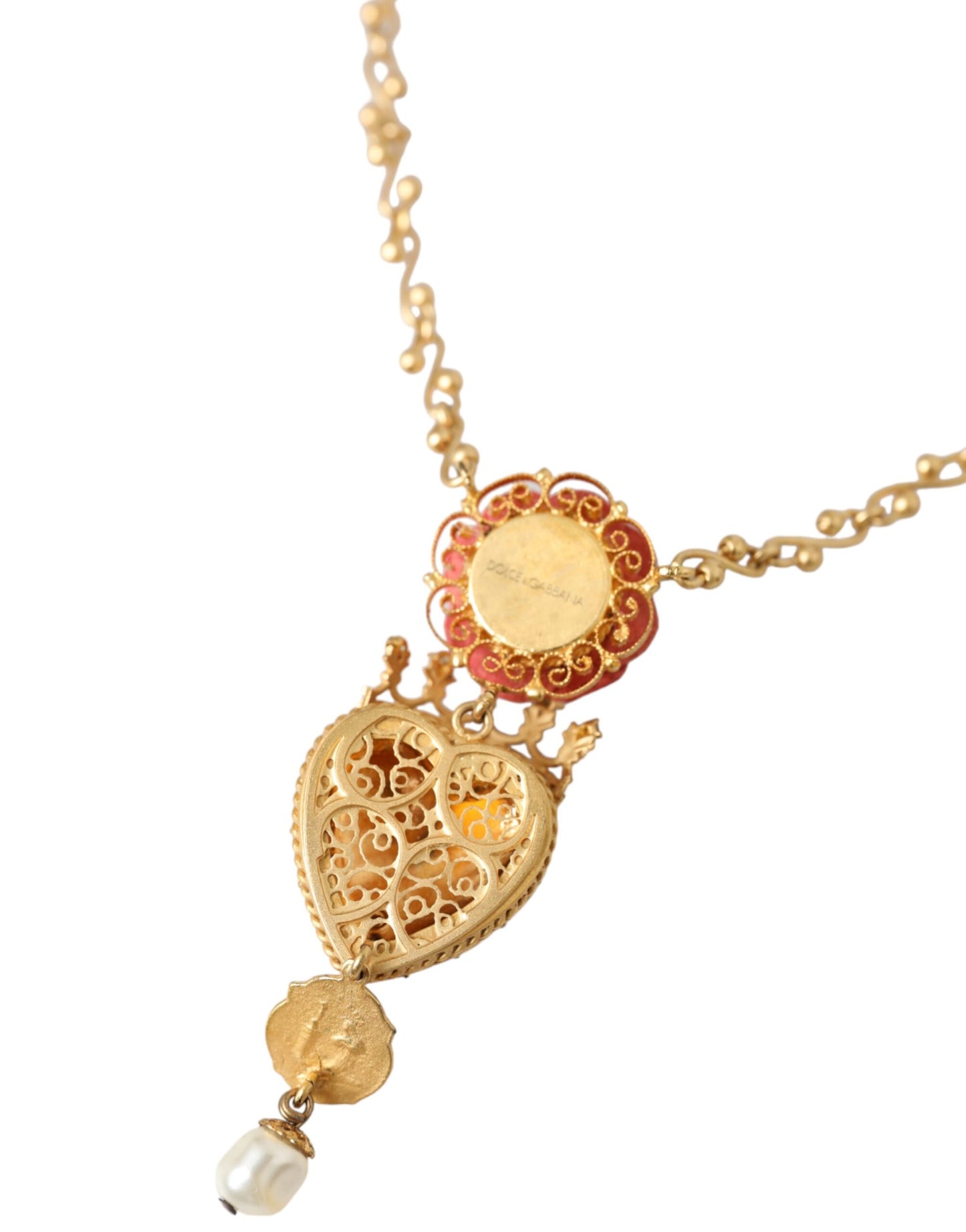 Collana con ciondolo in cristallo rosa con cuore sacro in ottone dorato