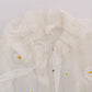Elegante camicetta in seta bianca con margherite