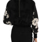 Schwarzer Pullover aus geblümtem Brokat