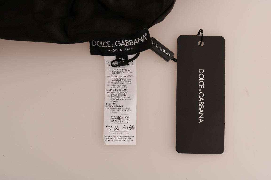 Schwarzer Pullover aus geblümtem Brokat