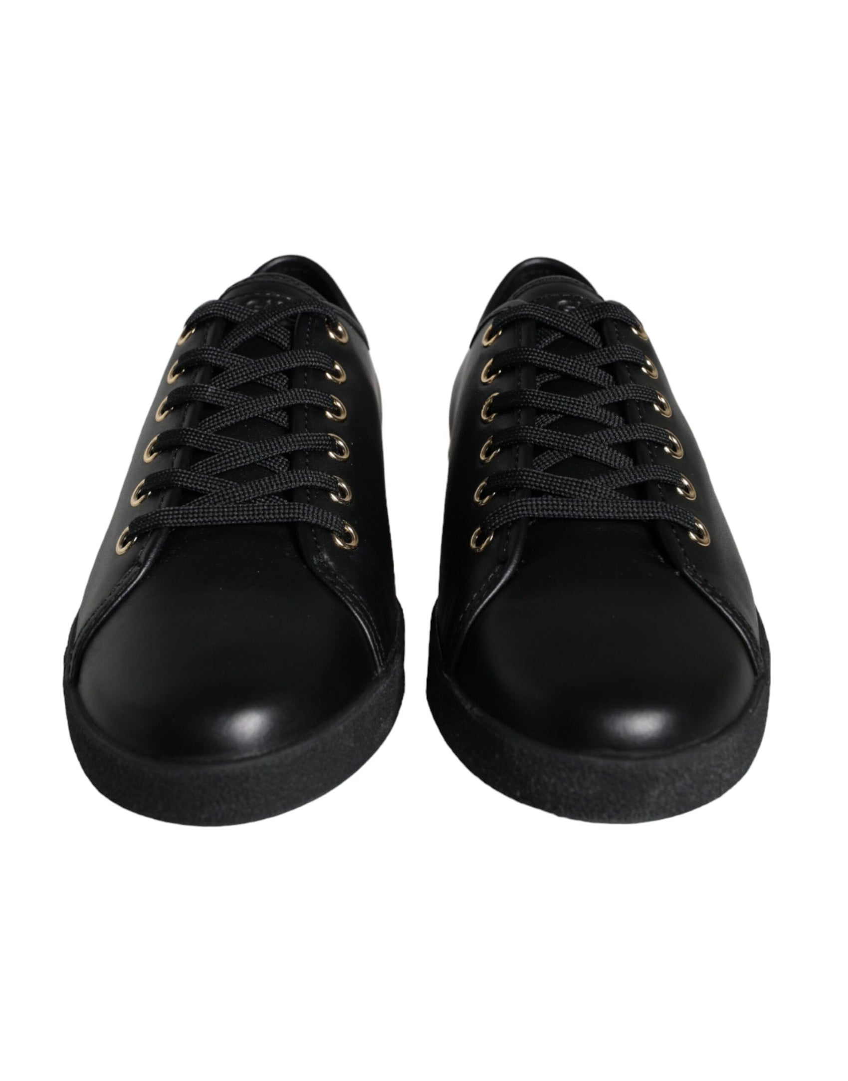 Klassische Sneakers aus schwarzem und goldenem Leder