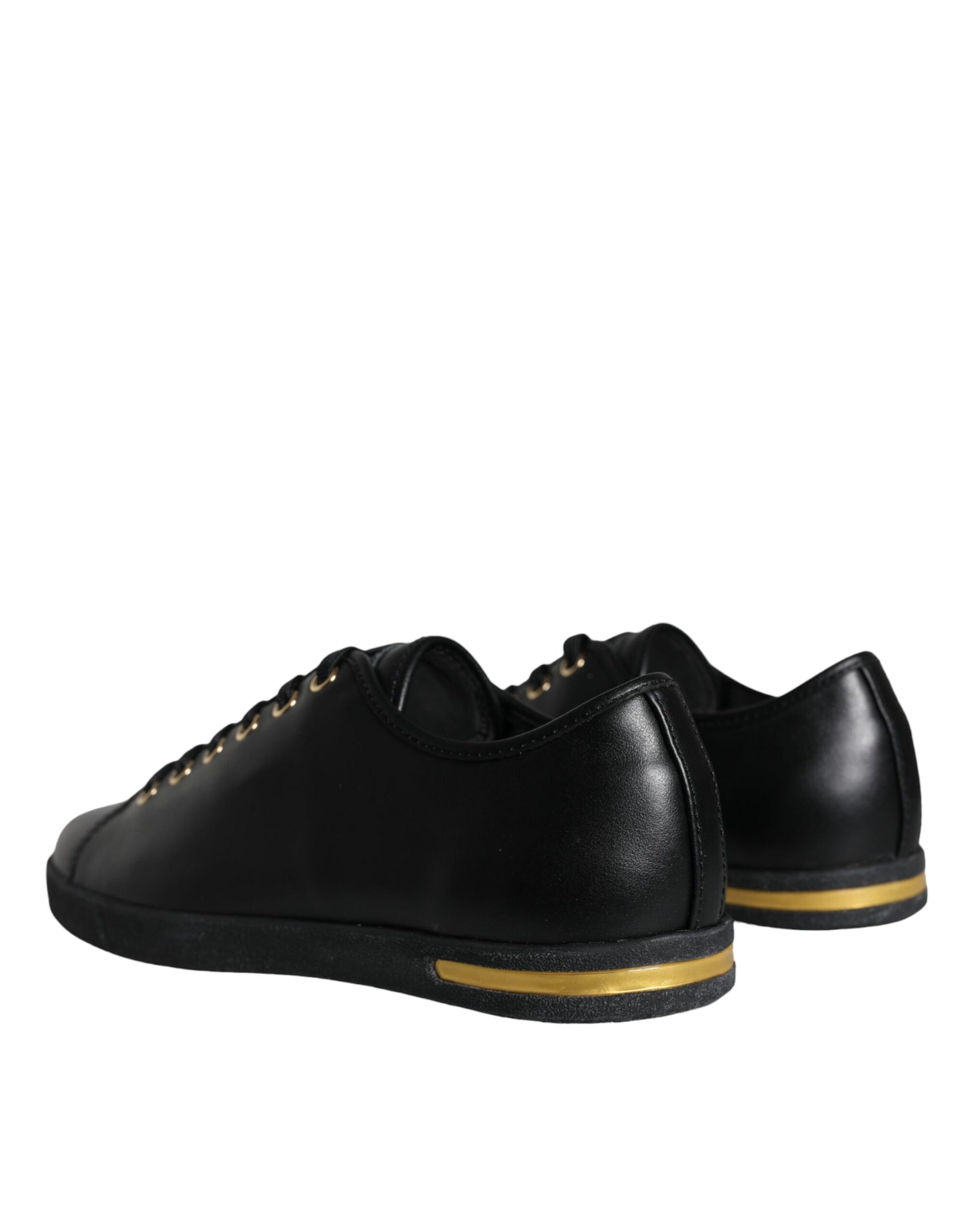Klassische Sneakers aus schwarzem und goldenem Leder