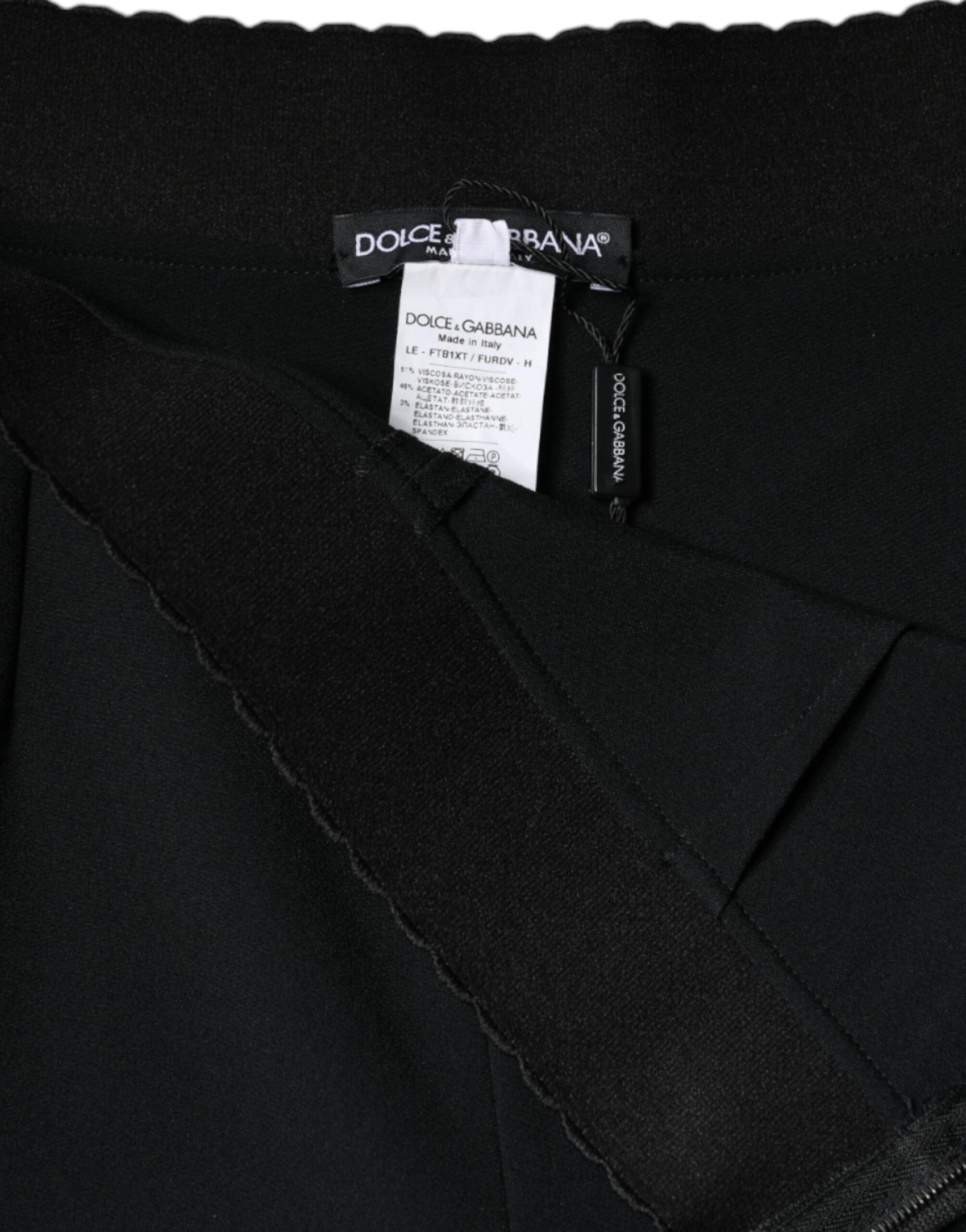 Schwarze, hoch taillierte, schmal zulaufende Viskosehose