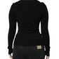 Blusa nera a maniche lunghe con scollo quadrato
