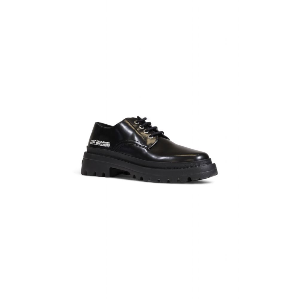 Schwarzer flacher Schuh aus Polyethylen