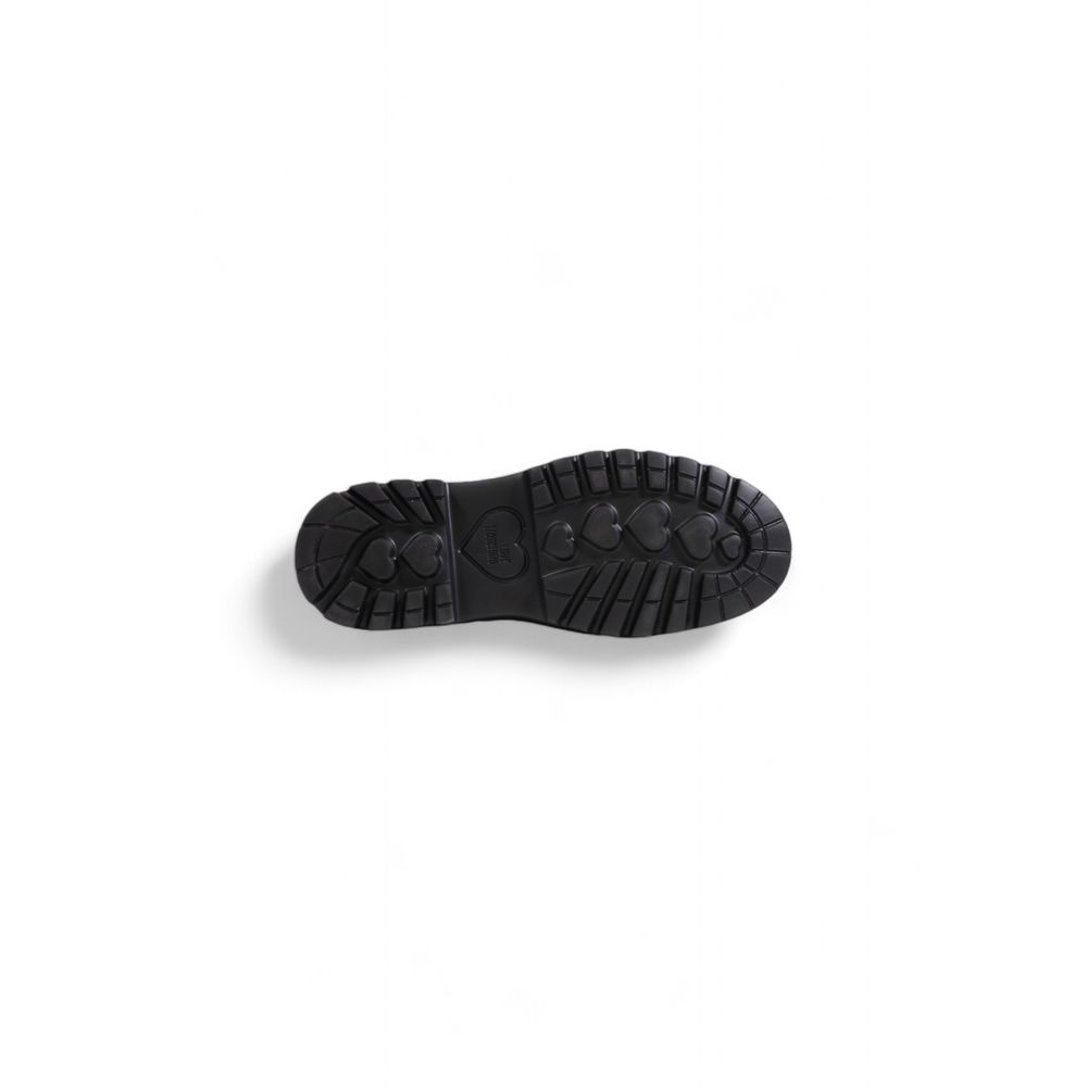 Schwarzer flacher Schuh aus Polyethylen
