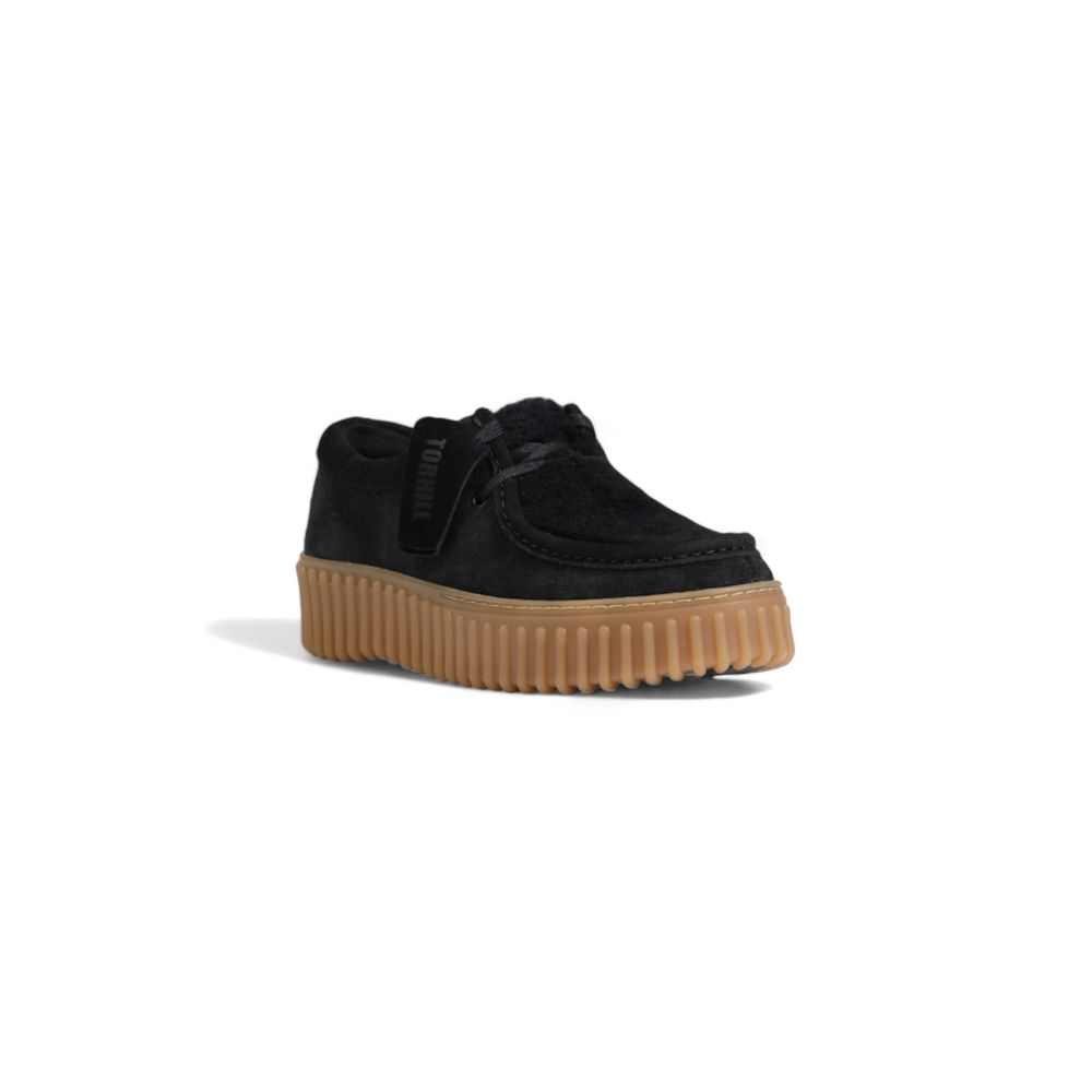 Flache Schuhe aus schwarzem Schwamm