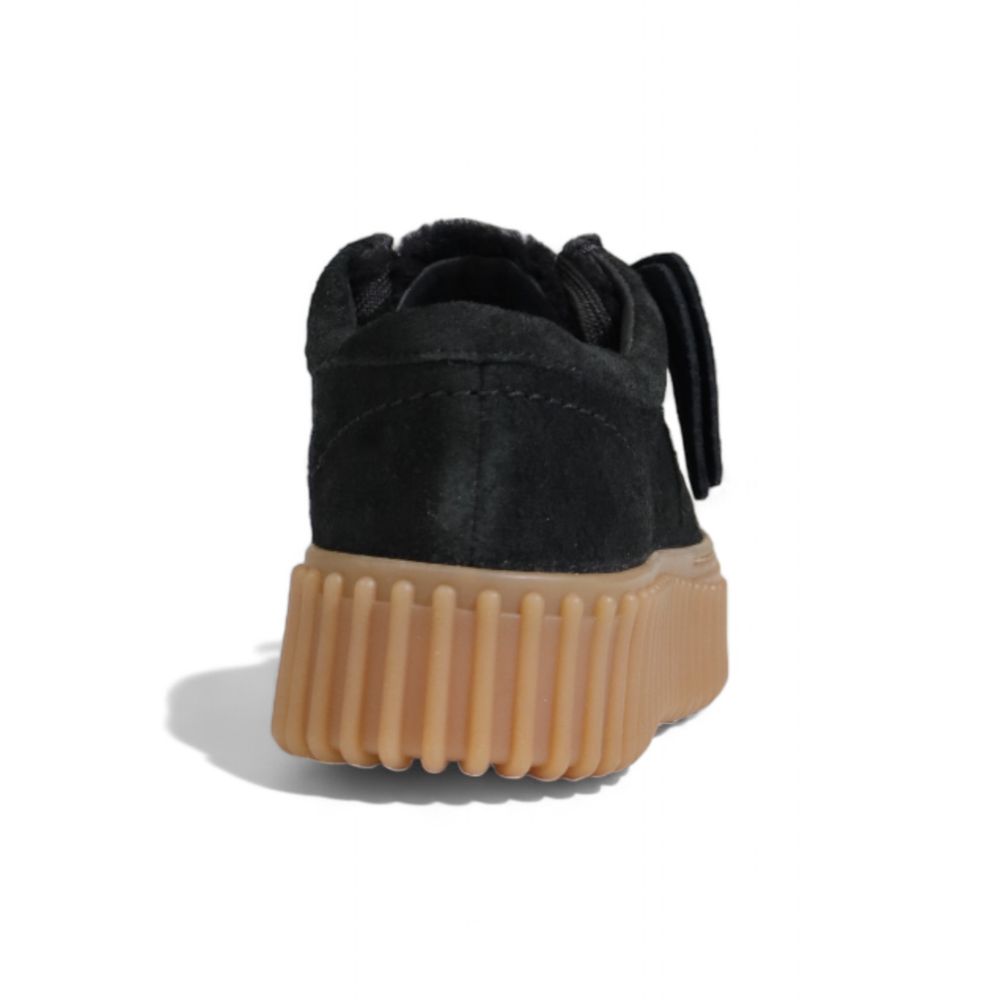 Flache Schuhe aus schwarzem Schwamm