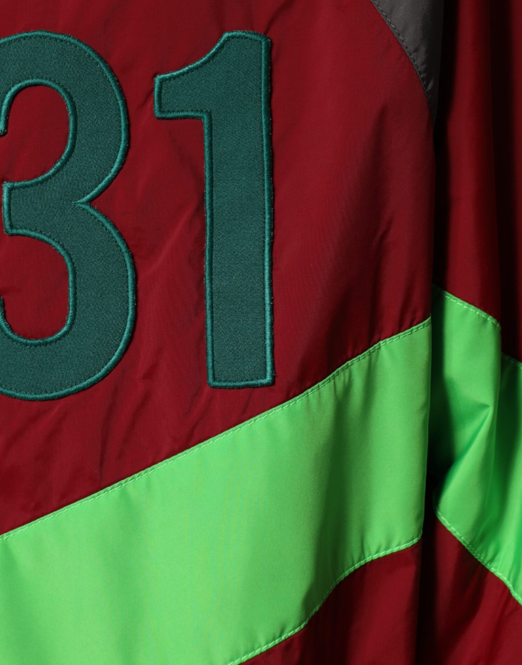 Mehrfarbige Windjacke aus Nylon mit durchgehendem Reißverschluss