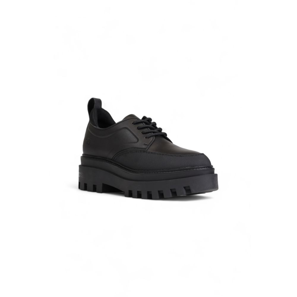 Schwarzer flacher Schuh aus Polyethylen