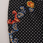 Pantaloni eleganti con pois decorati