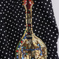 Pantaloni eleganti con pois decorati