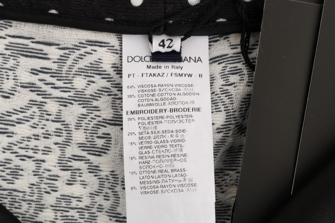 Pantaloni eleganti con pois decorati