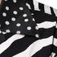 Schwarz-weißes Oversize-Hemd mit Zebra-Knopfleiste