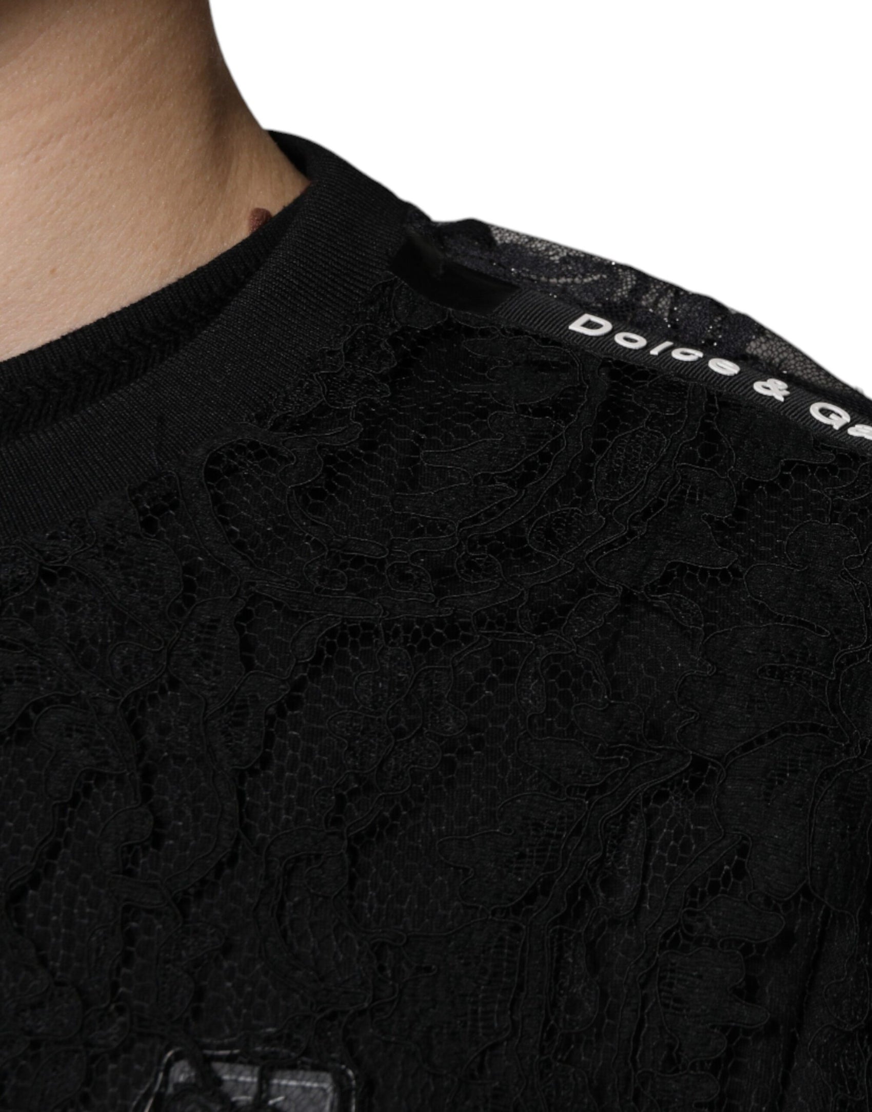 Schwarzes Nylon-T-Shirt mit Blumenspitze und Rundhalsausschnitt