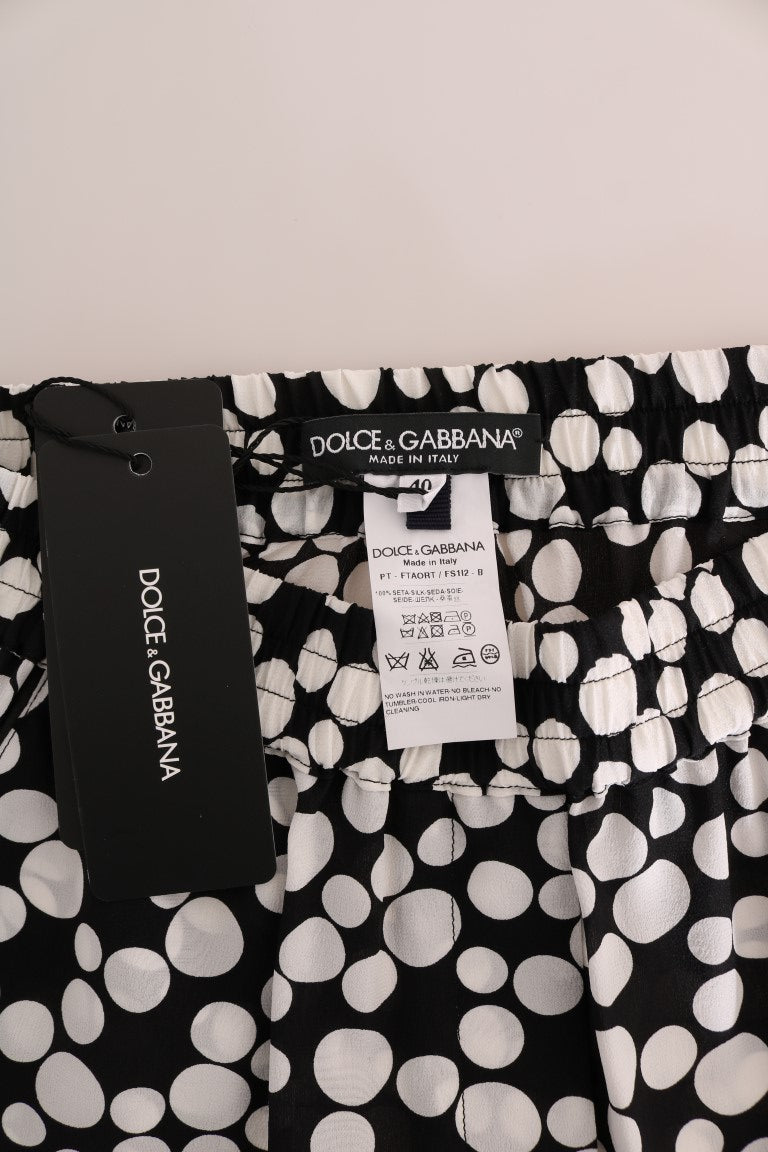 Elegante Seidenhose mit hoher Taille und gepunkteten Punkten