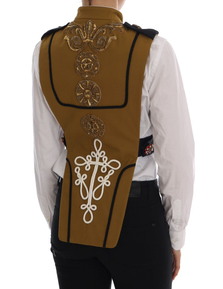 Gilet con croce di cristallo decorato da passerella