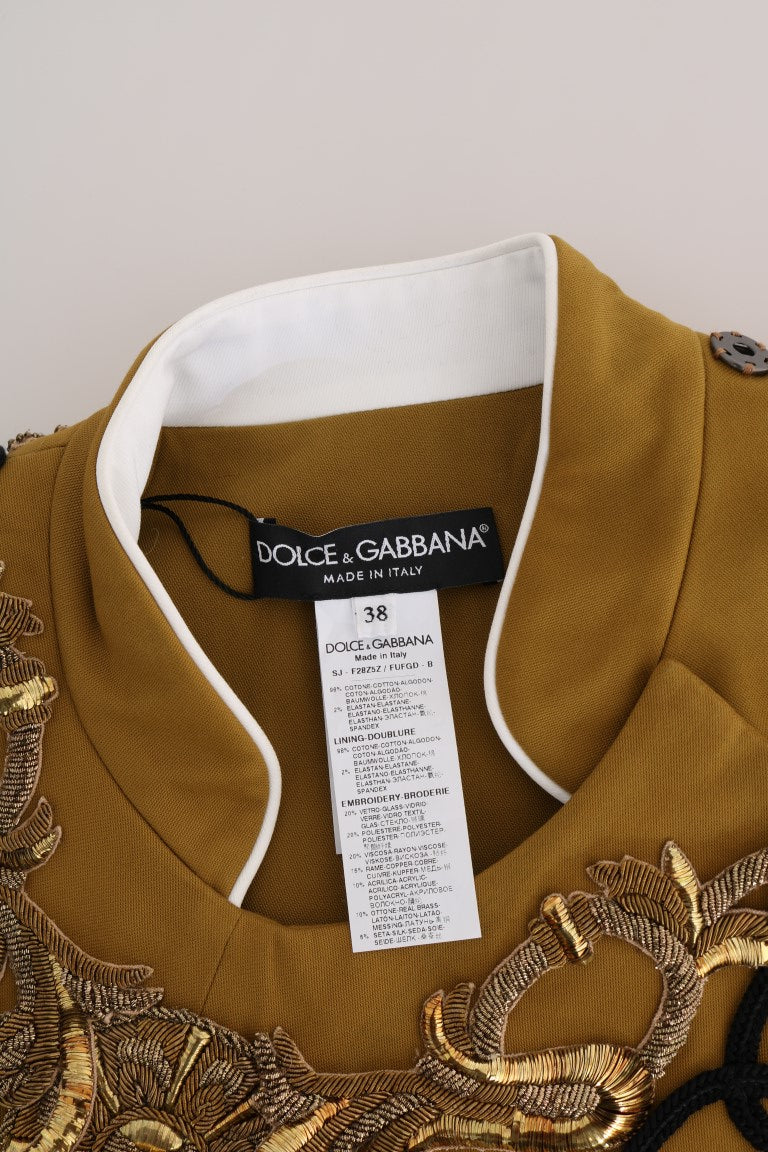 Gilet con croce di cristallo decorato da passerella