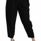 Schwarze, verkürzte Hose aus Wolle mit hoher Taille und Bundfalten vorne