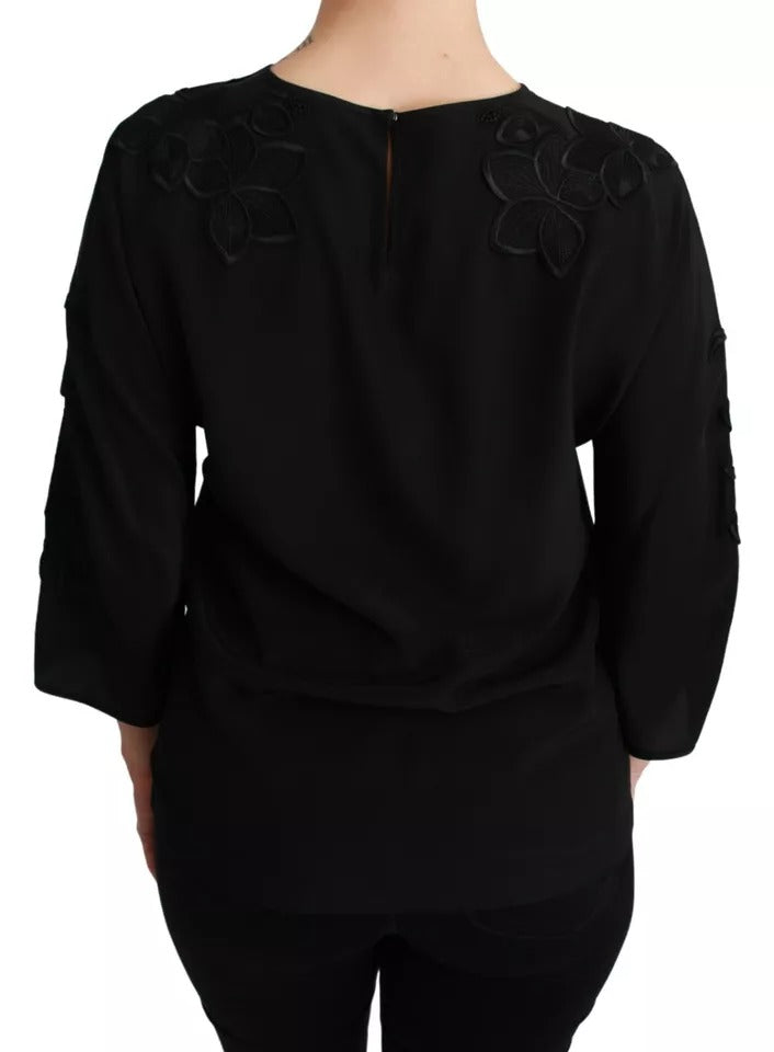 Top in seta con camicetta ricamata floreale nera