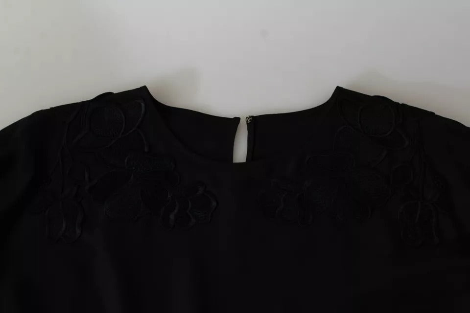 Top in seta con camicetta ricamata floreale nera