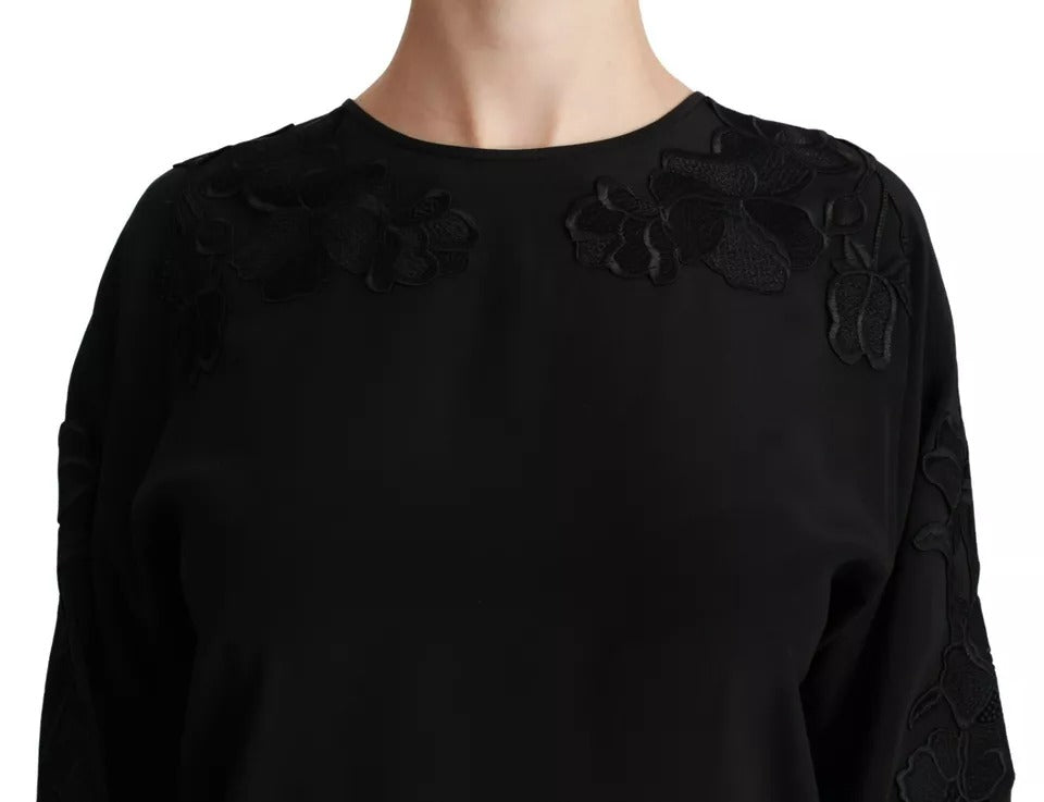 Top in seta con camicetta ricamata floreale nera