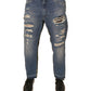 Blaue, zerfetzte, gerade geschnittene Jeans