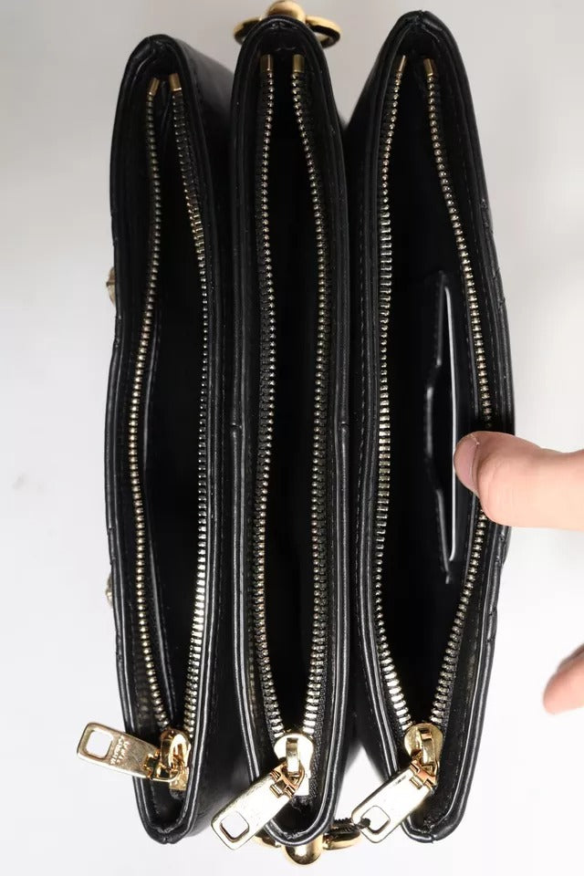 Schwarze Schultertasche aus Leder mit Kristallverzierung und Logo