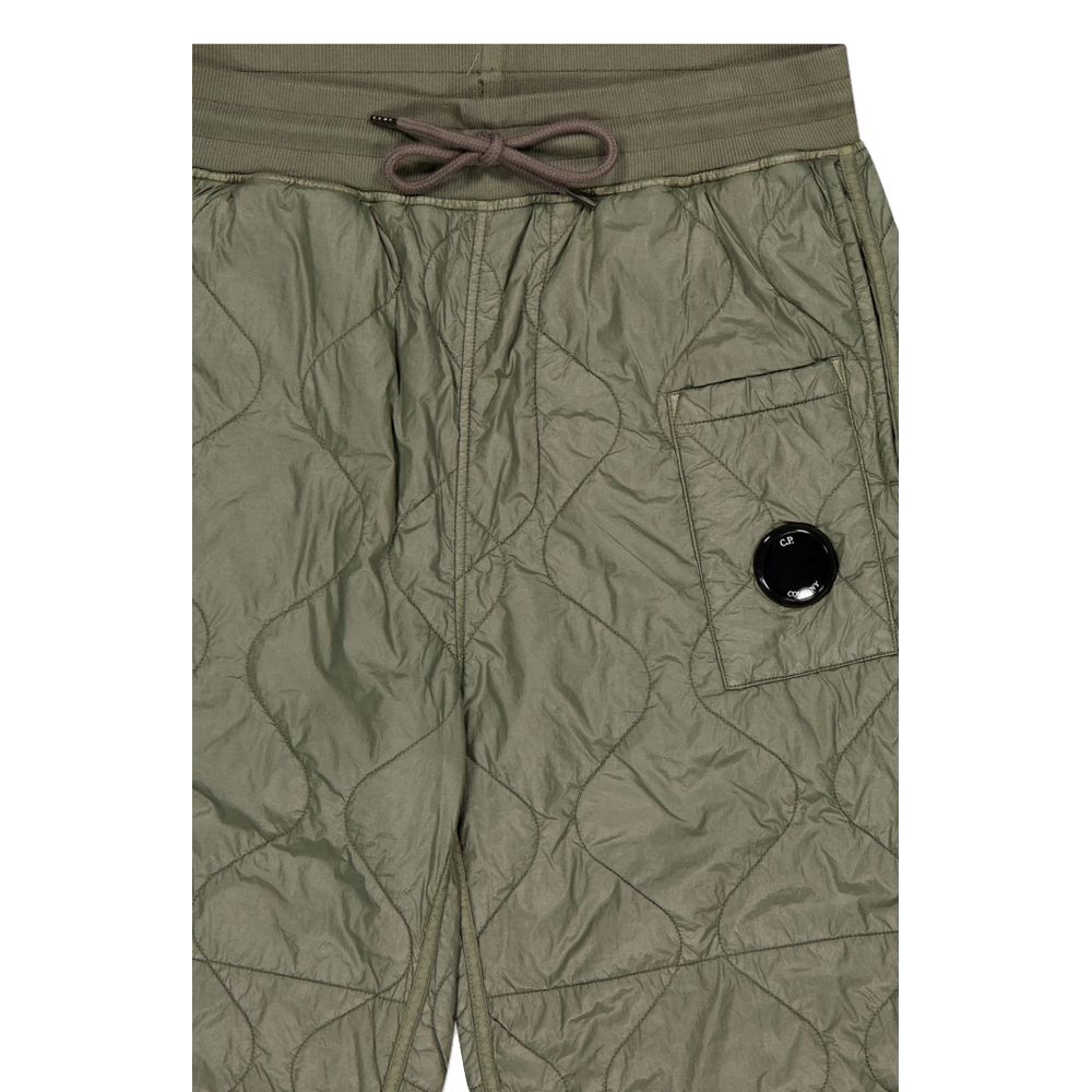 Grüne Nylonjeans und Hose