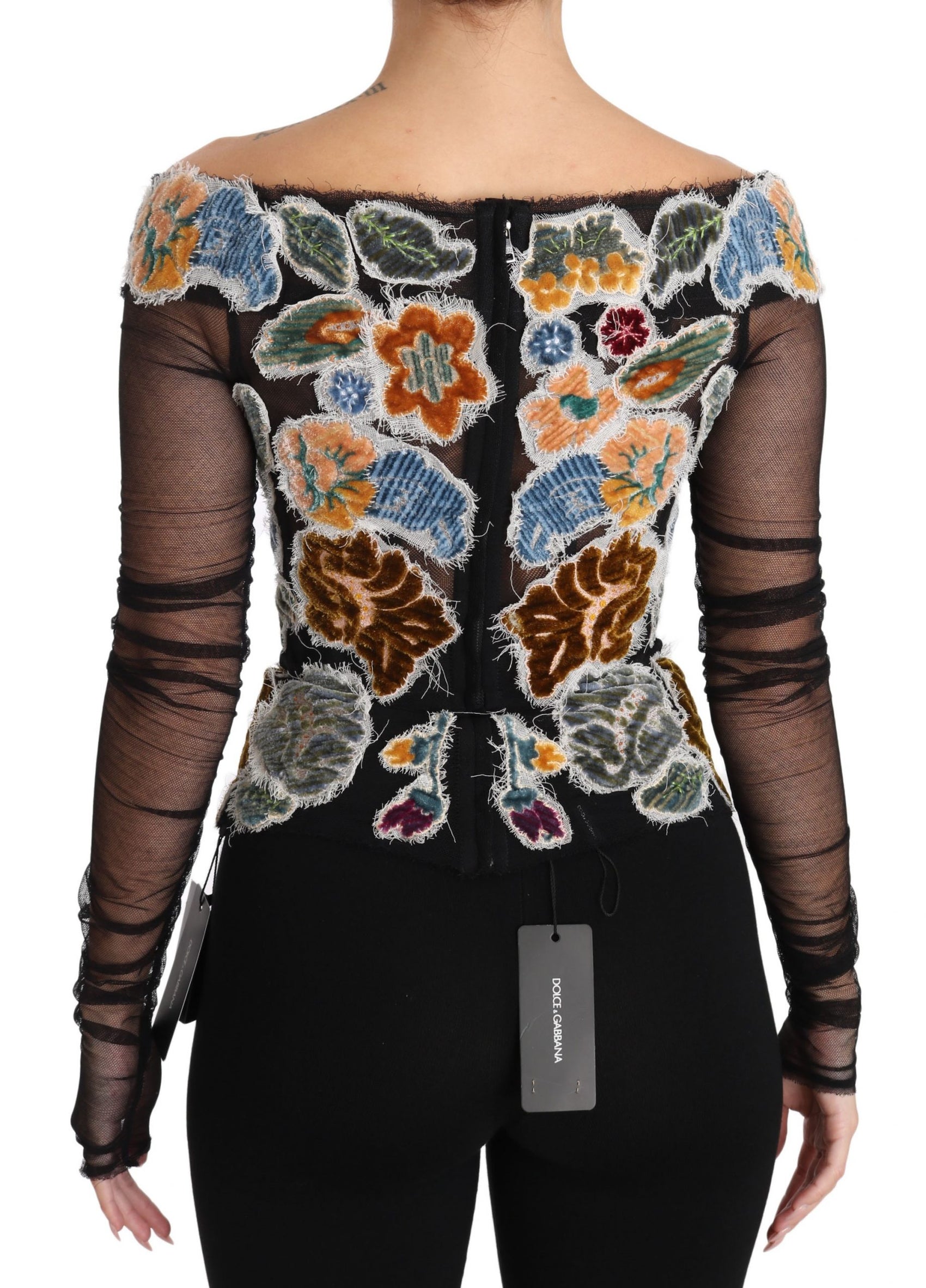 Elegantes Langarm-Top mit Blumenapplikation