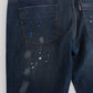 Jeans slim fit dipinti con lavaggio blu chic